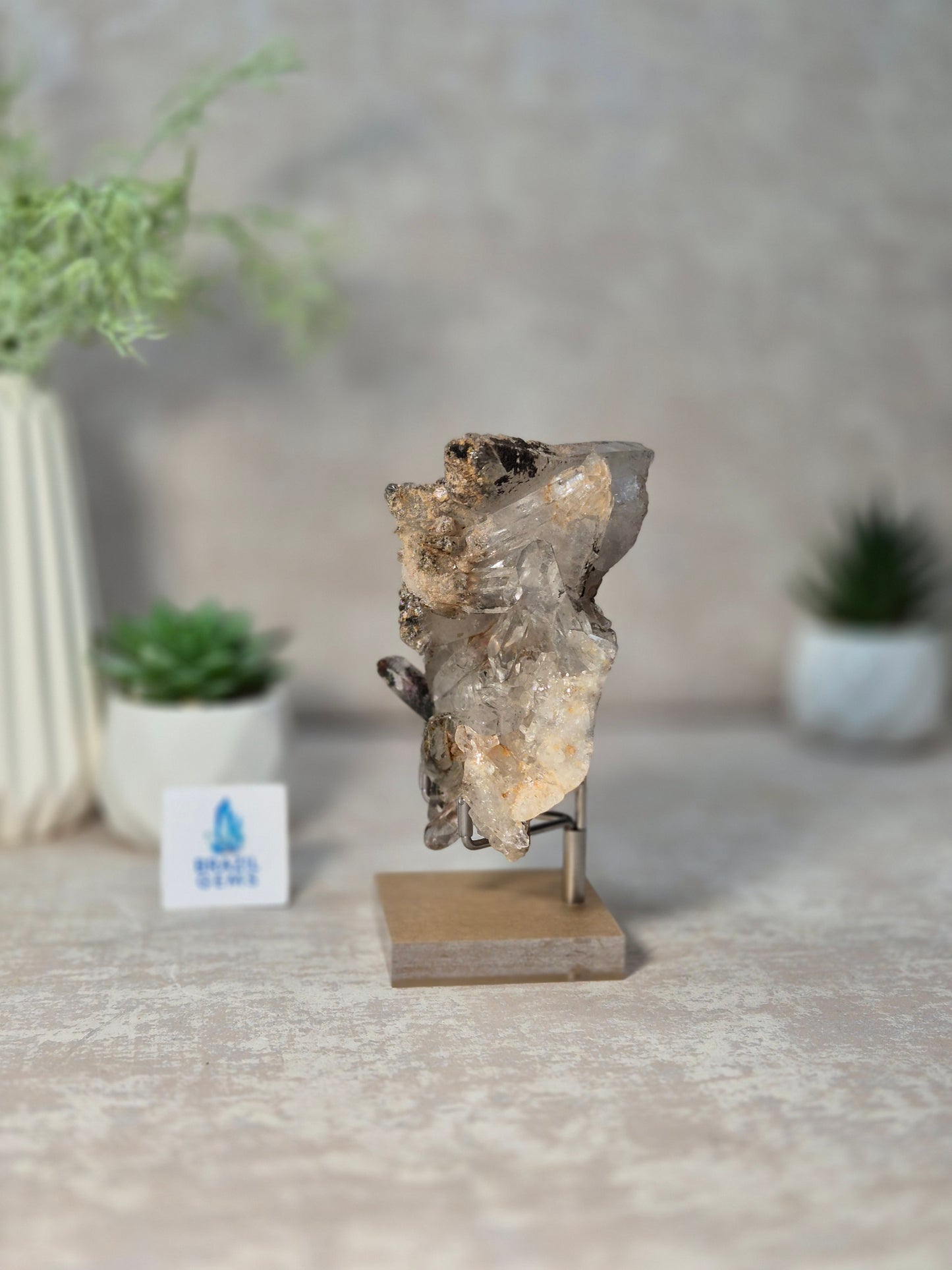 Lodolite Quartz Cluster on the stand