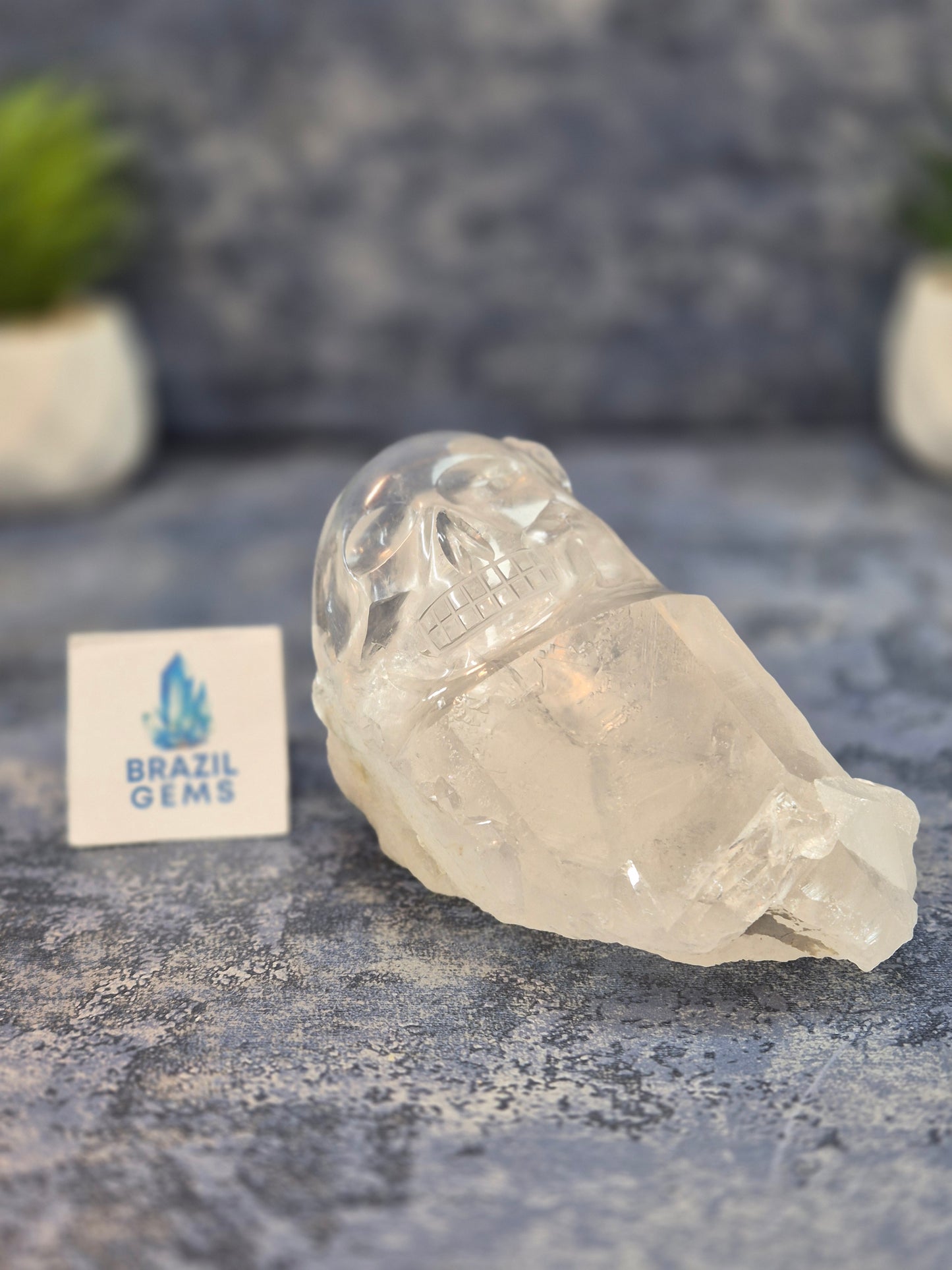Hand Carved Clear Quartz Skull on Natural Cluster Base