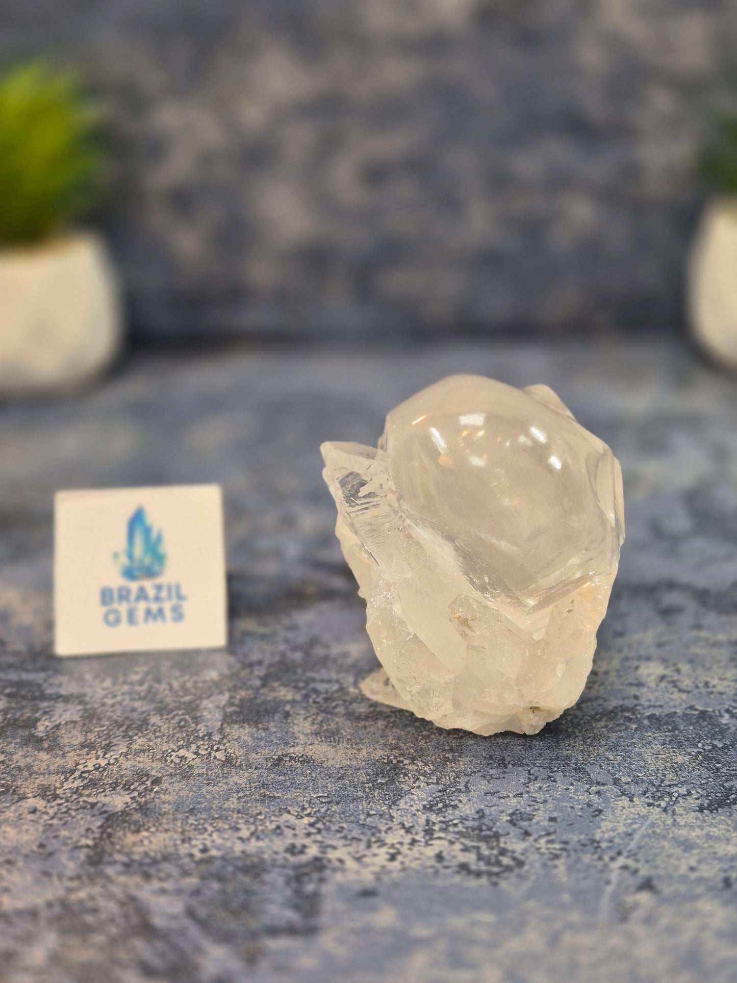 Hand Carved Clear Quartz Skull on Natural Cluster Base