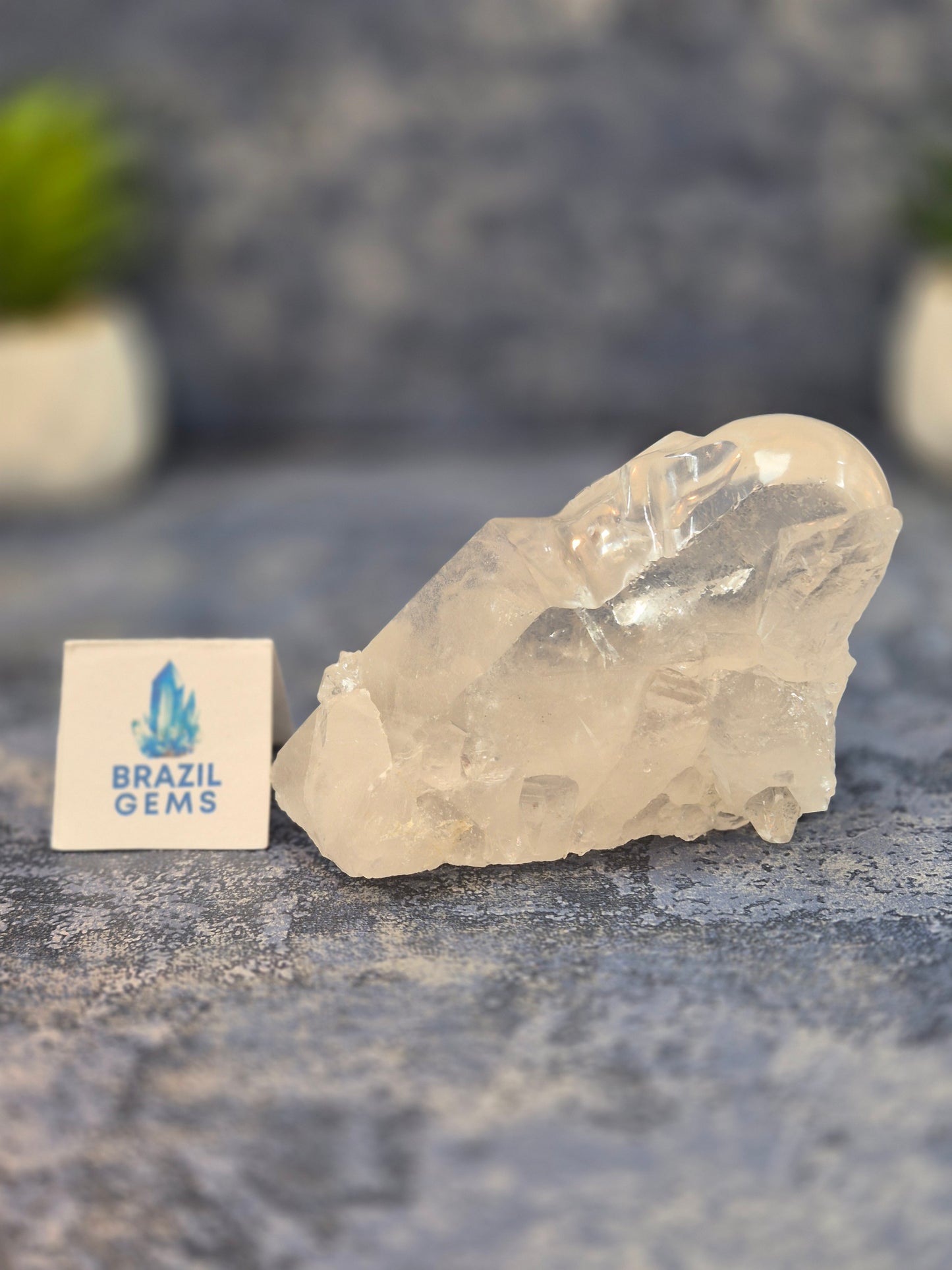 Hand Carved Clear Quartz Skull on Natural Cluster Base