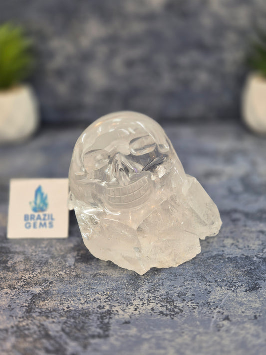 Hand Carved Clear Quartz Skull on Natural Cluster Base
