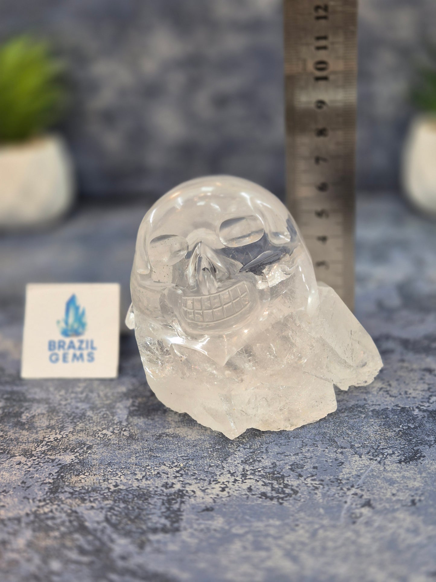 Hand Carved Clear Quartz Skull on Natural Cluster Base