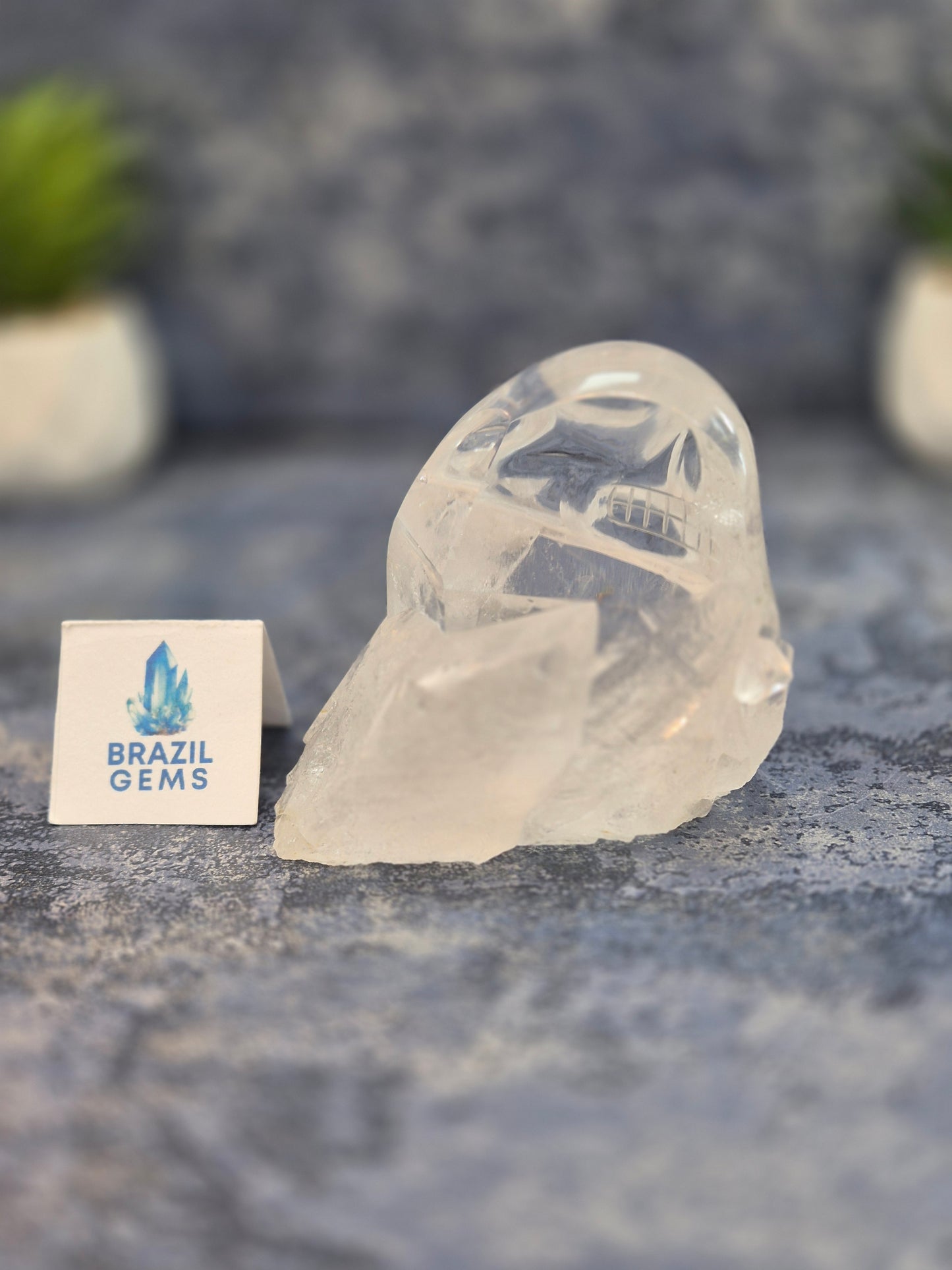 Hand Carved Clear Quartz Skull on Natural Cluster Base