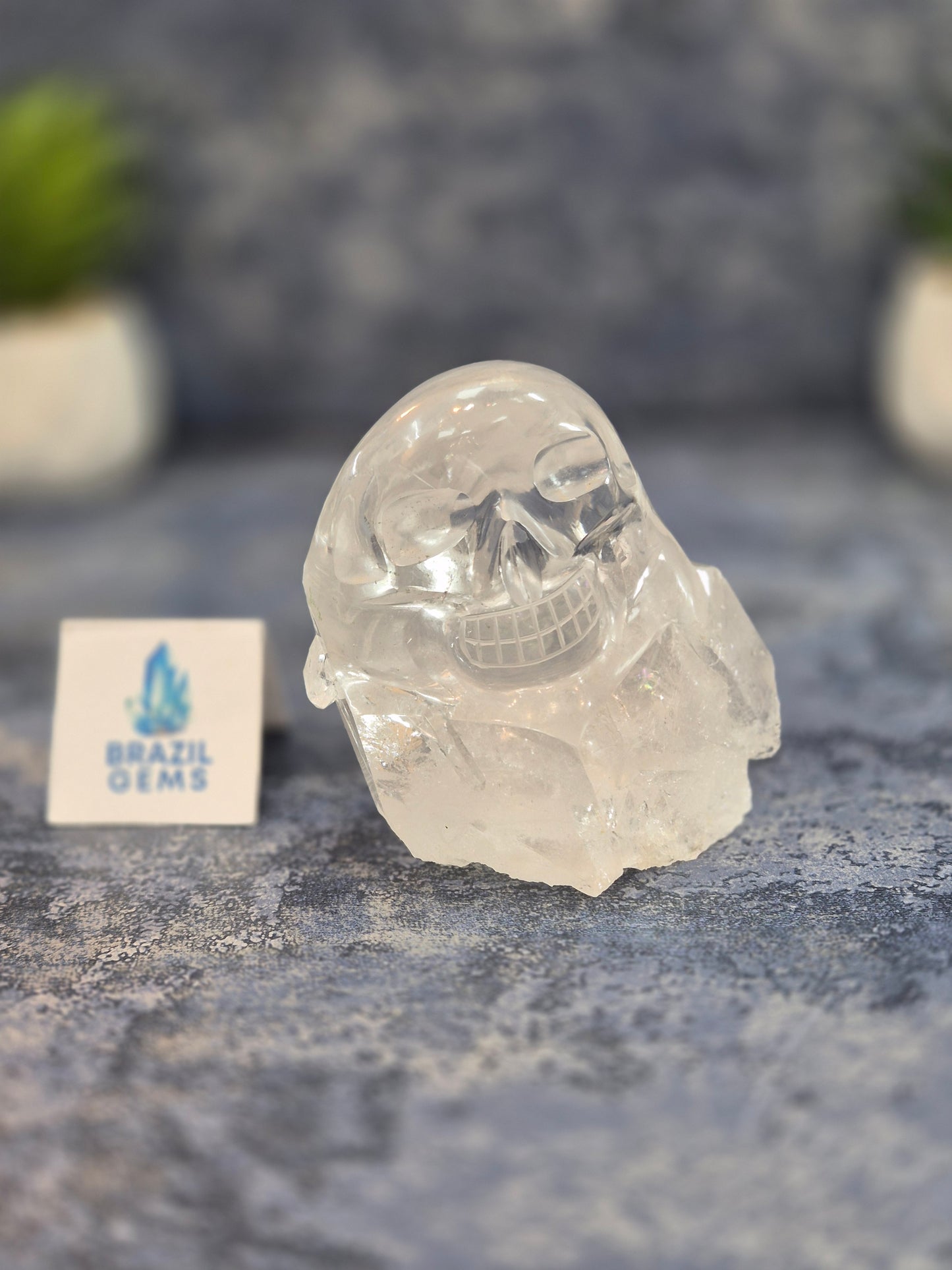 Hand Carved Clear Quartz Skull on Natural Cluster Base