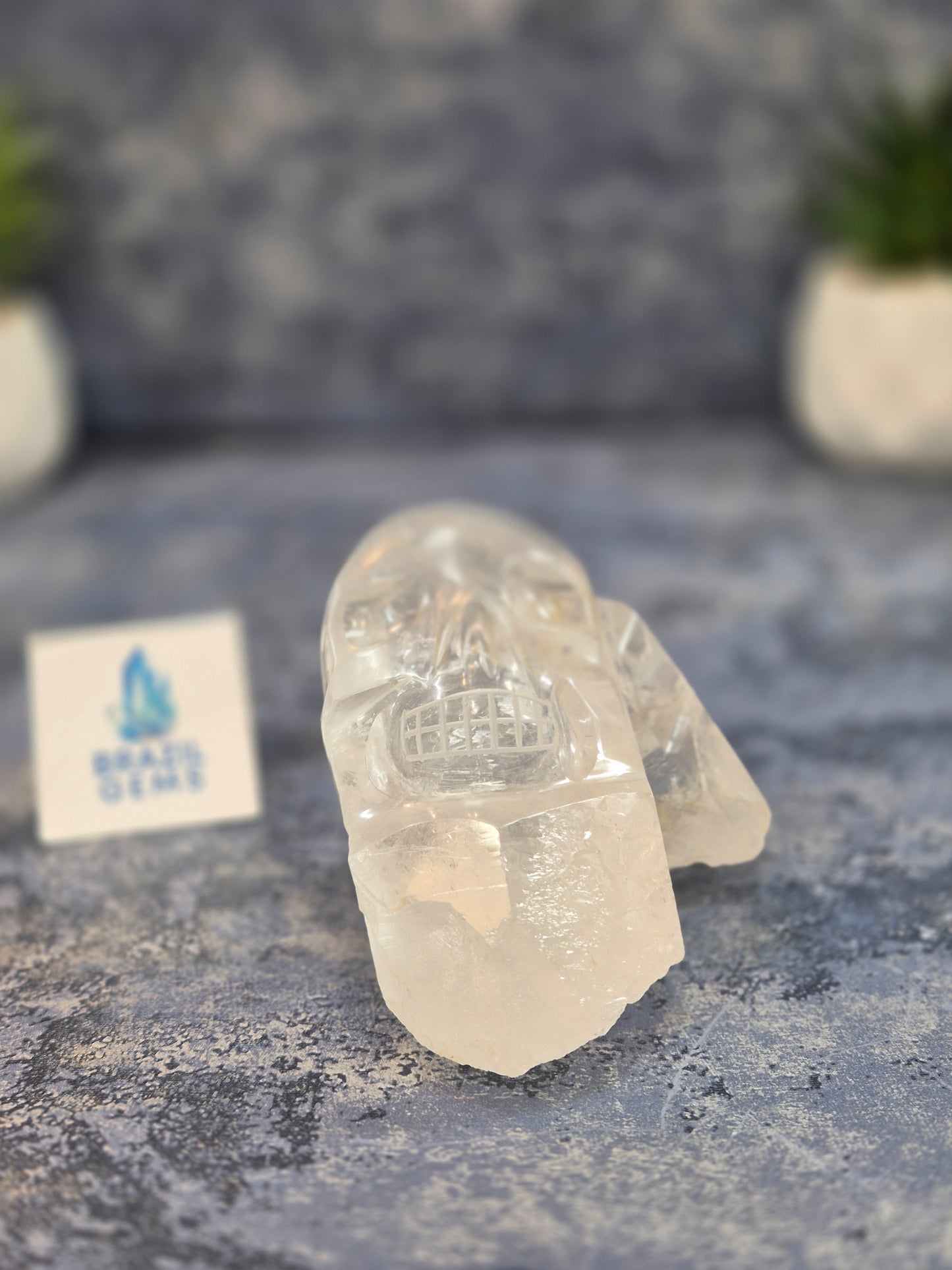 Hand Carved Clear Quartz Skull on Natural Cluster Base