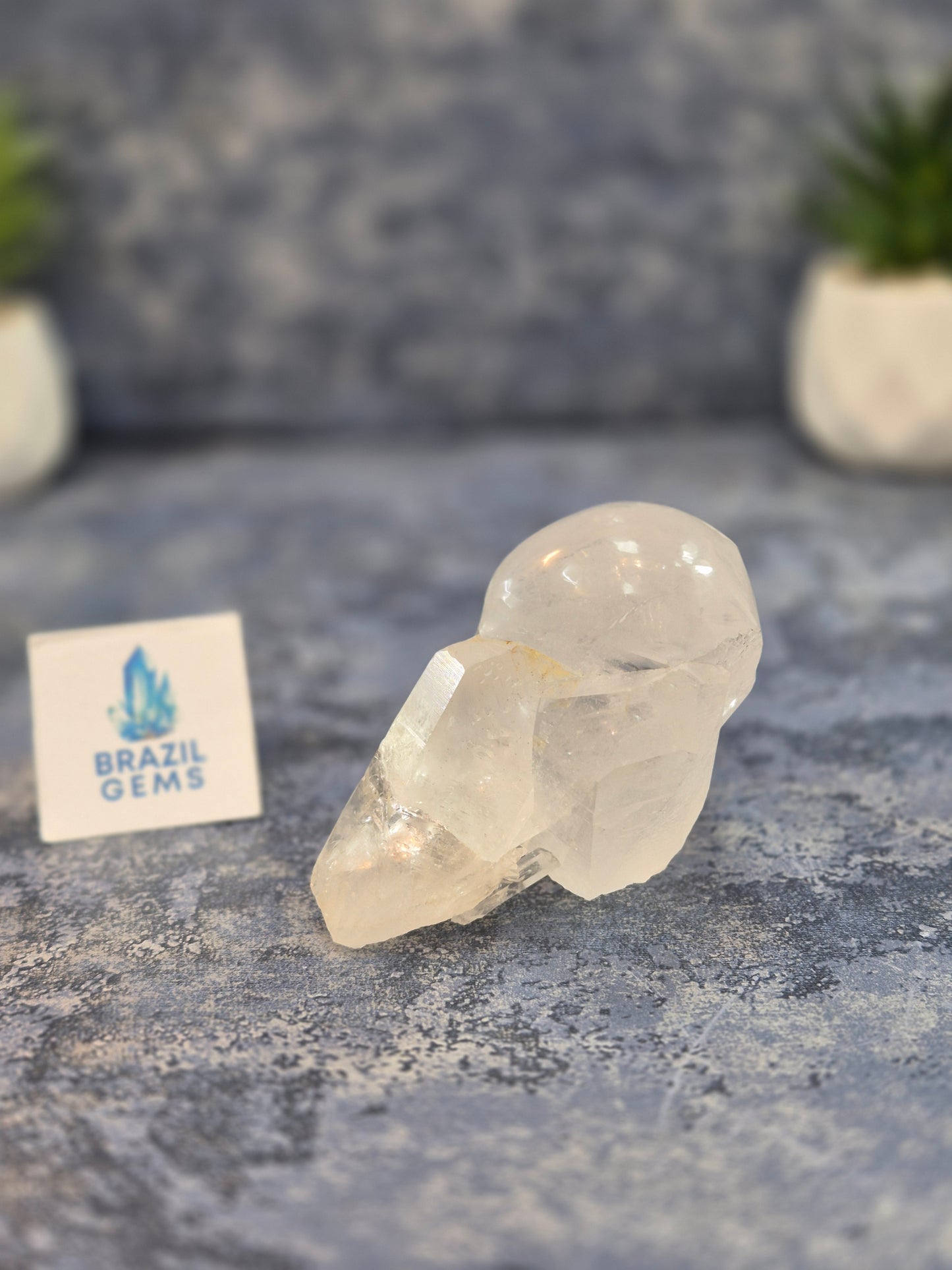 Hand Carved Clear Quartz Skull on Natural Cluster Base