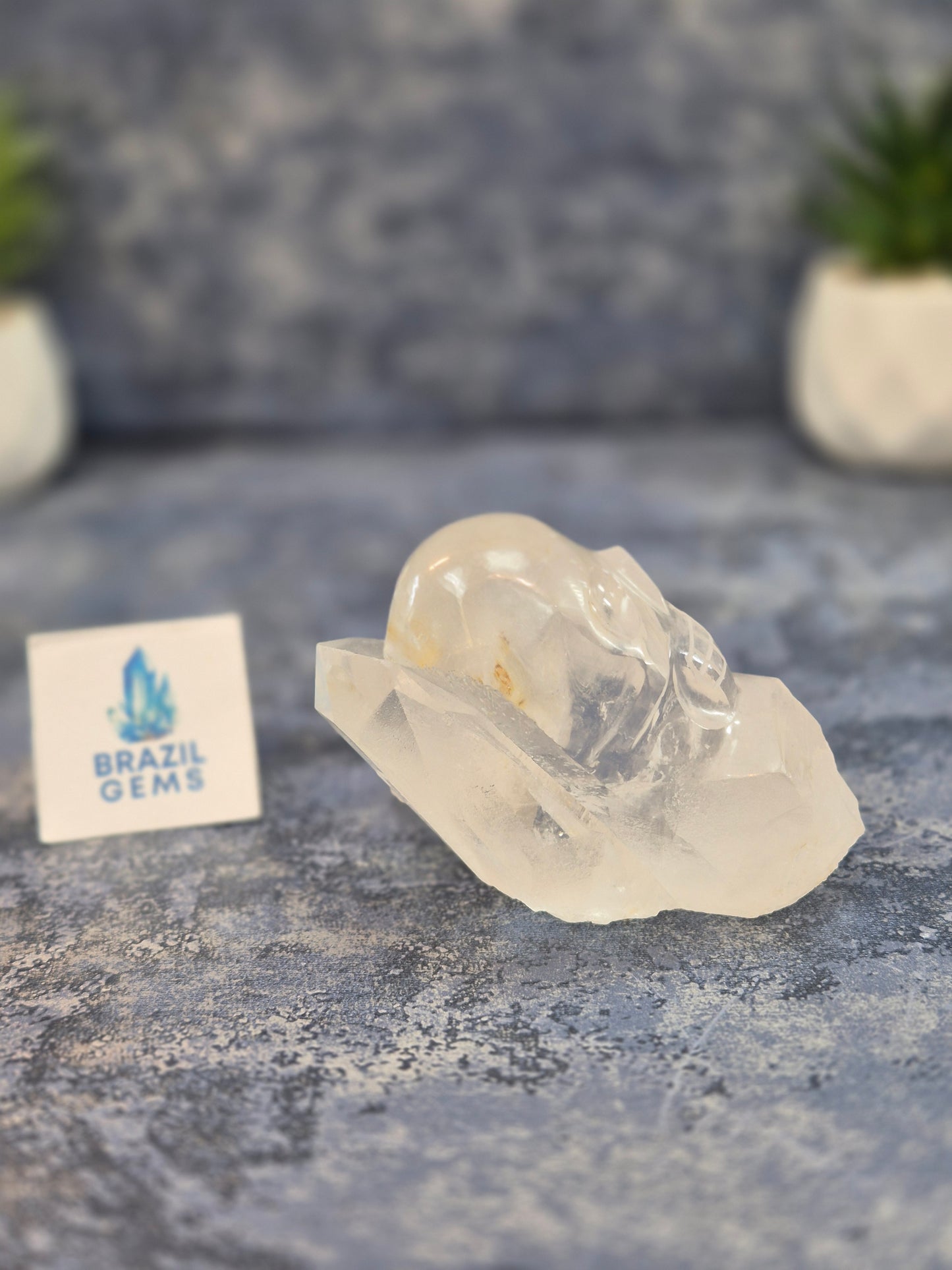 Hand Carved Clear Quartz Skull on Natural Cluster Base