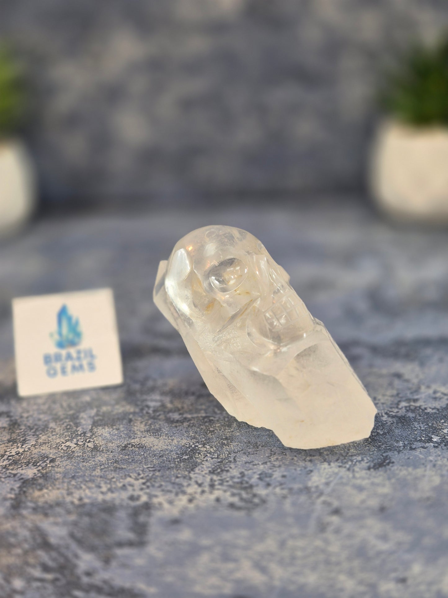 Hand Carved Clear Quartz Skull on Natural Cluster Base