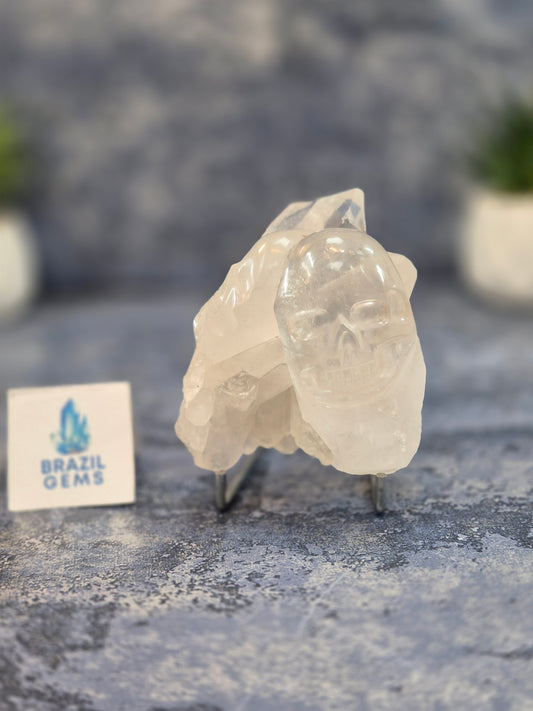 Hand Carved 2 Clear Quartz Skulls on Natural Cluster Base