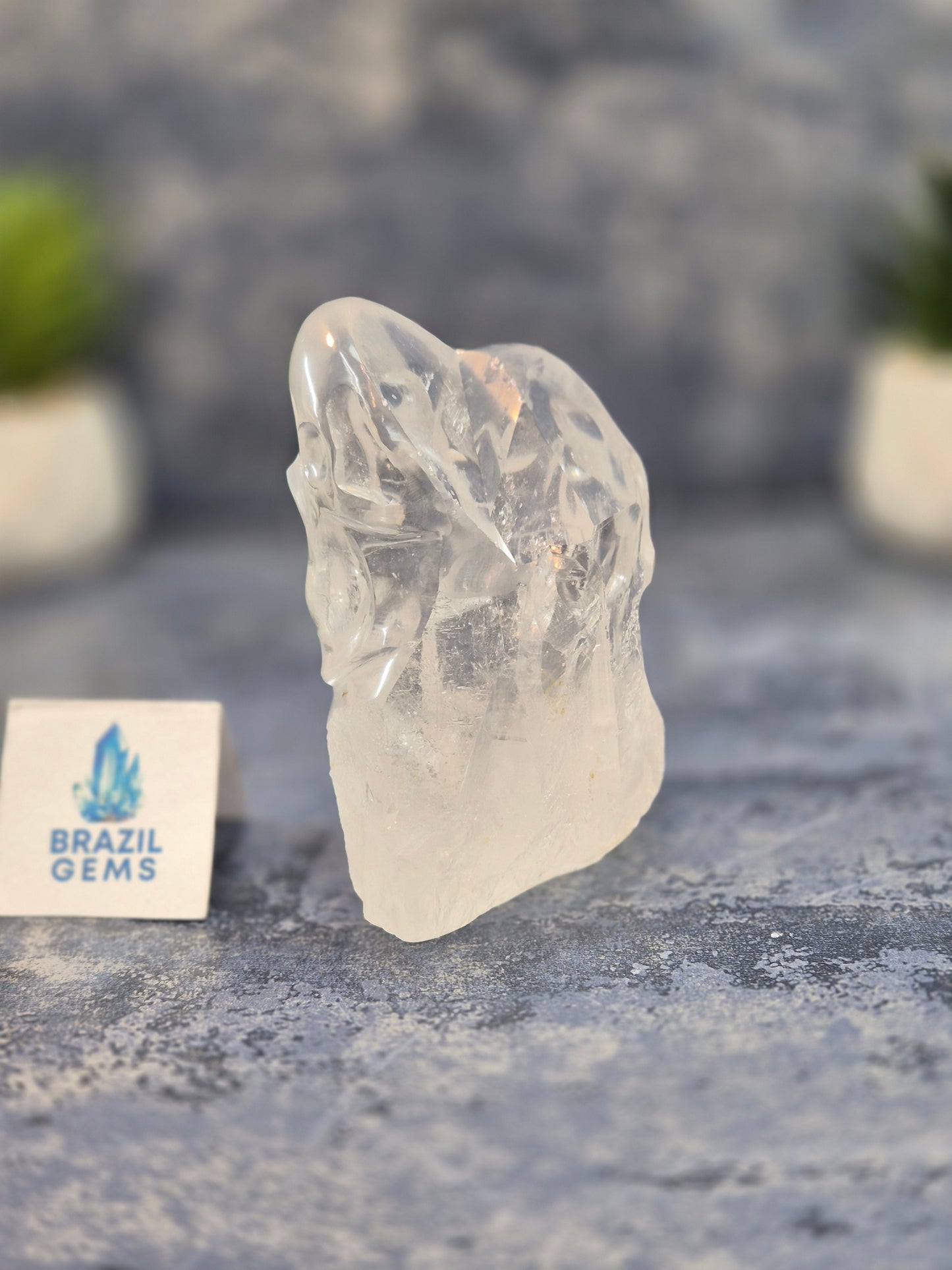 Hand Carved 2 Clear Quartz Skulls on Natural Cluster Base