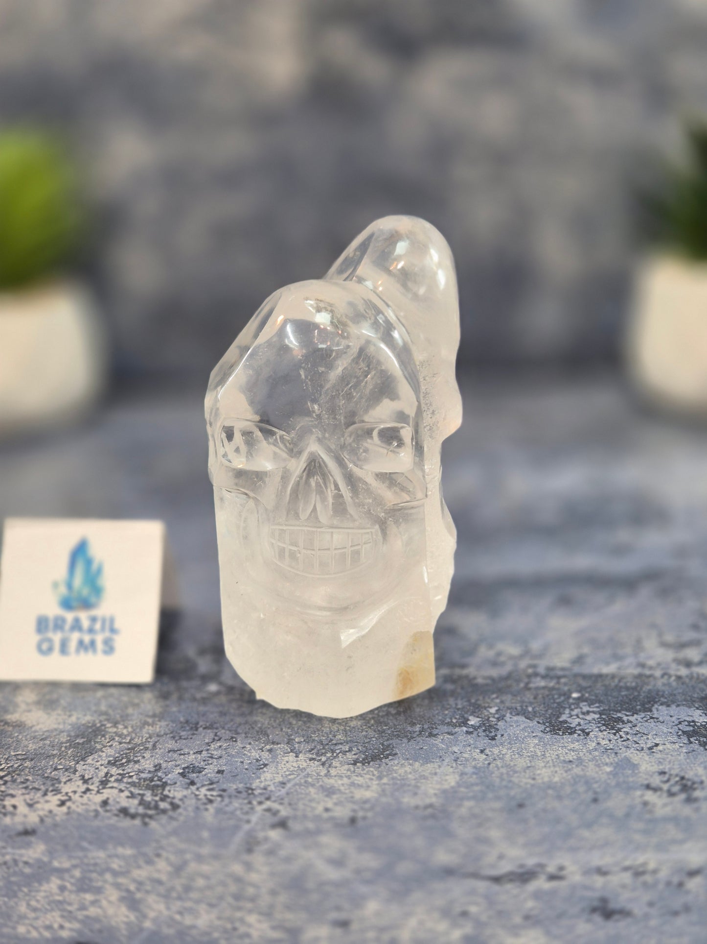 Hand Carved 2 Clear Quartz Skulls on Natural Cluster Base