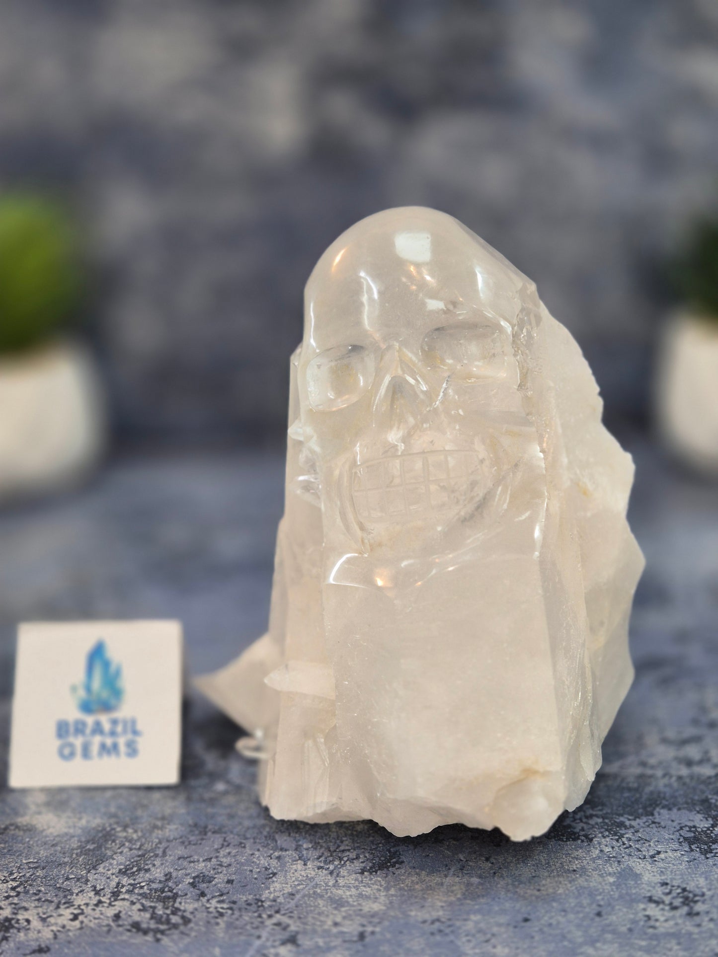Hand Carved Clear Quartz Skull on Natural Cluster Base