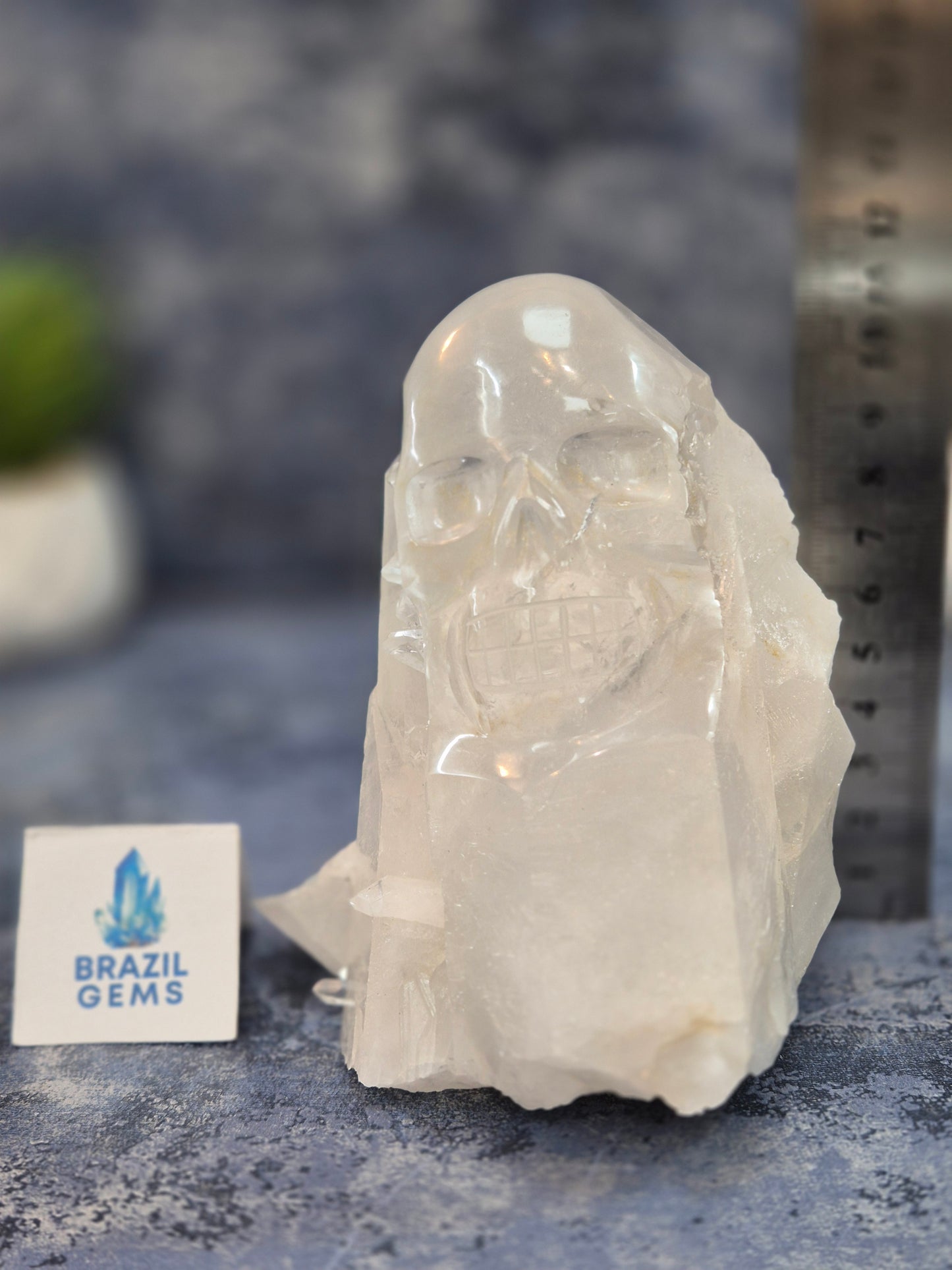 Hand Carved Clear Quartz Skull on Natural Cluster Base