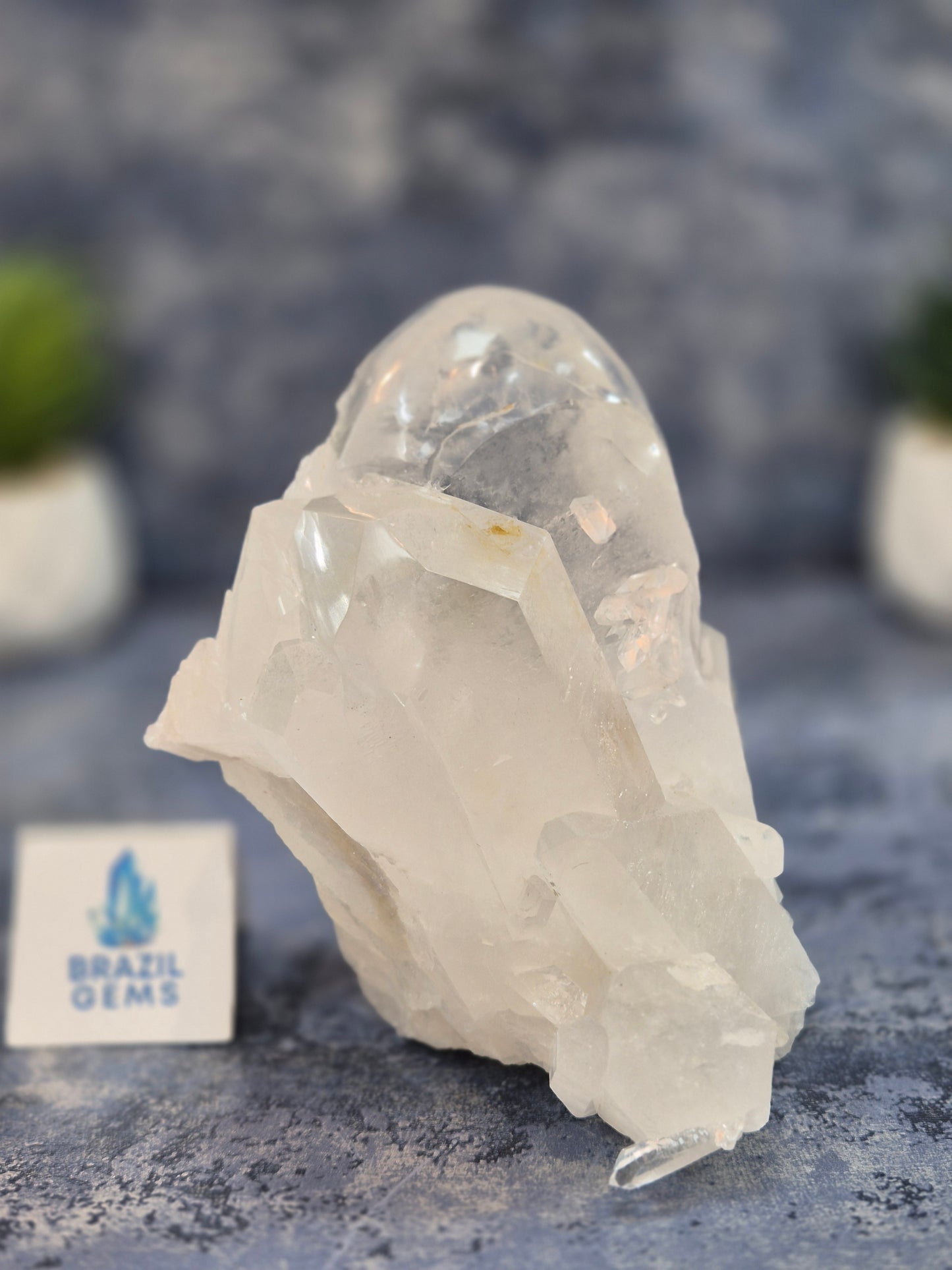 Hand Carved Clear Quartz Skull on Natural Cluster Base