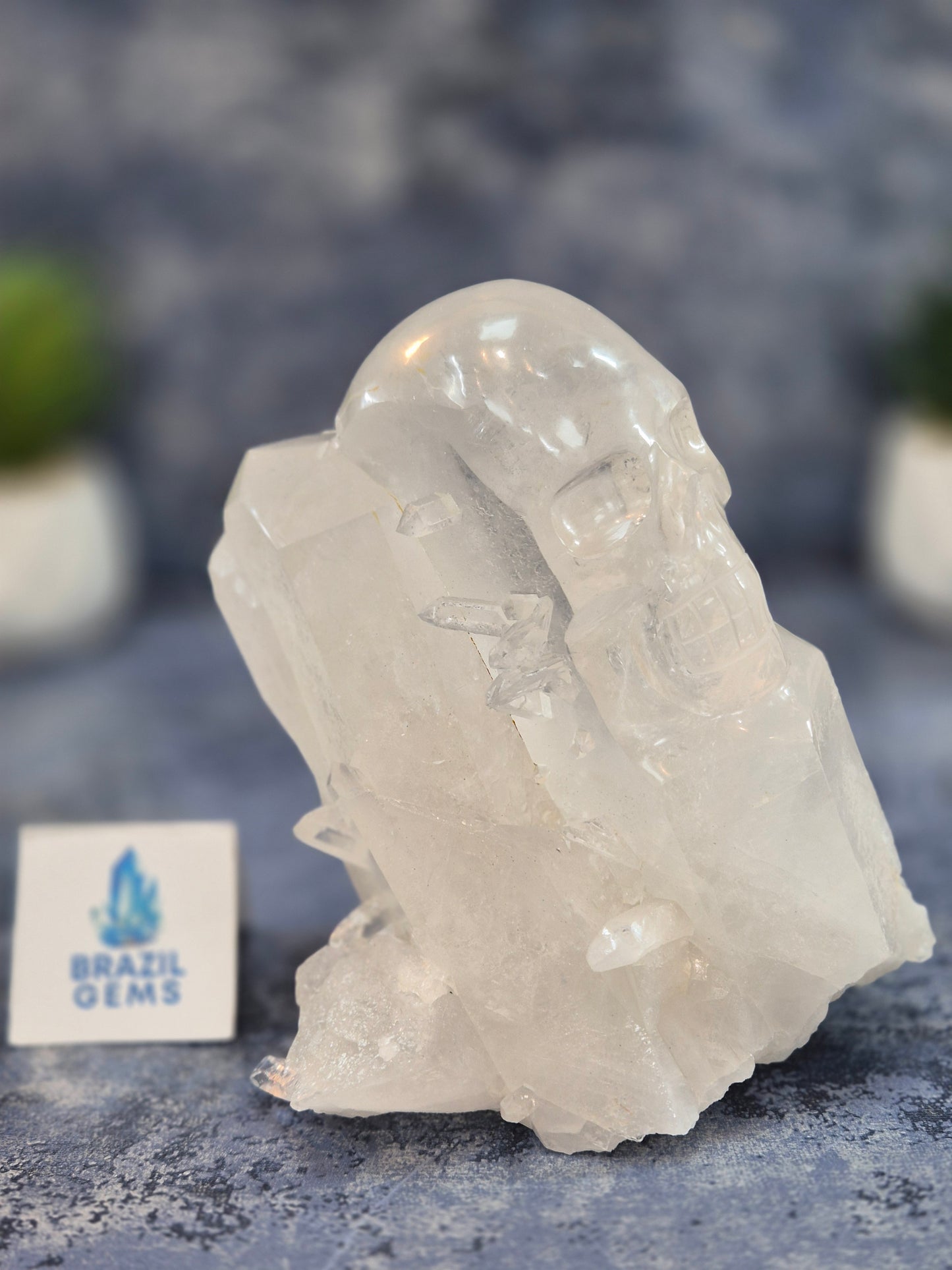 Hand Carved Clear Quartz Skull on Natural Cluster Base