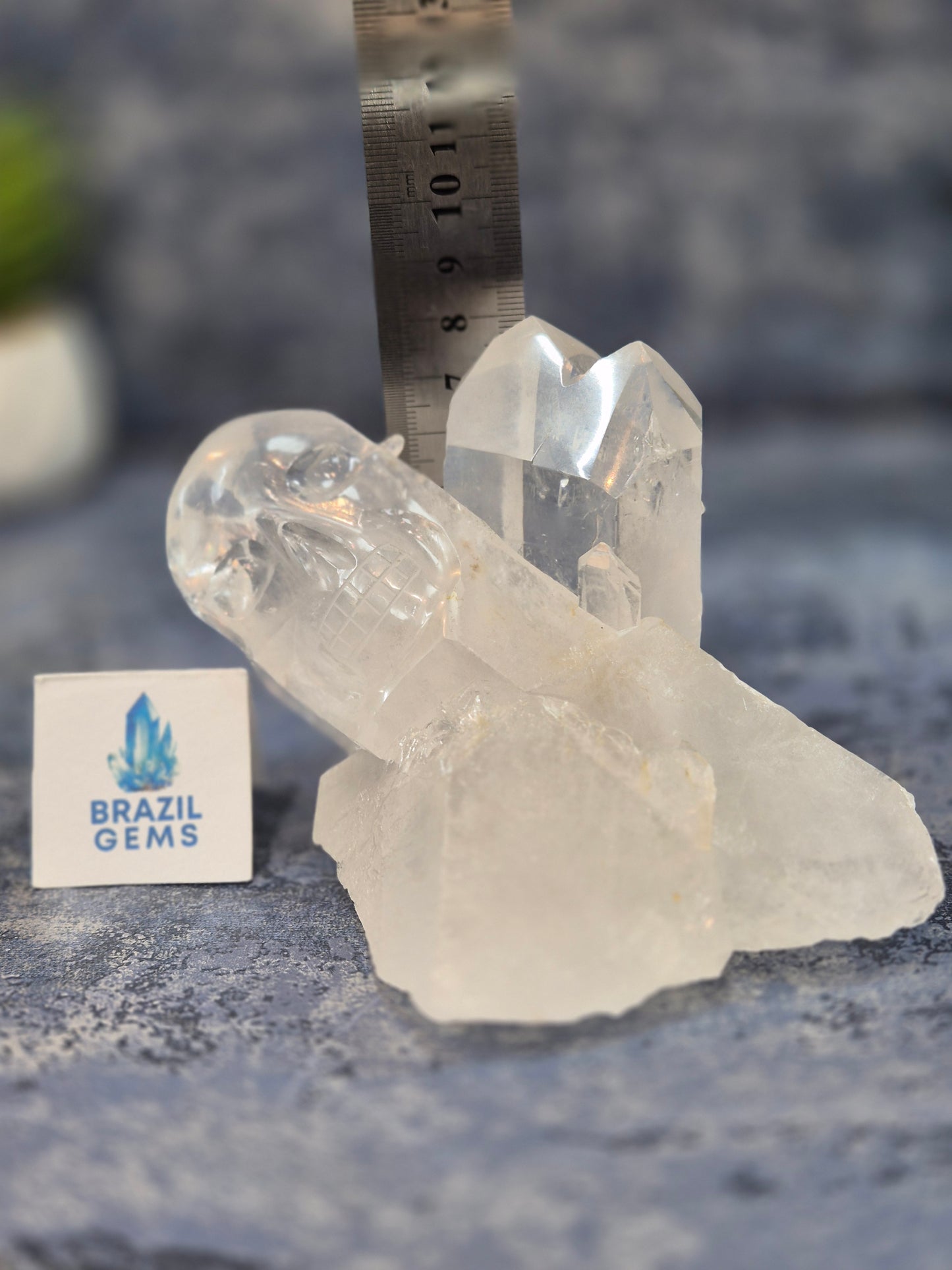 Hand Carved Clear Quartz Skull on Natural Cluster Base