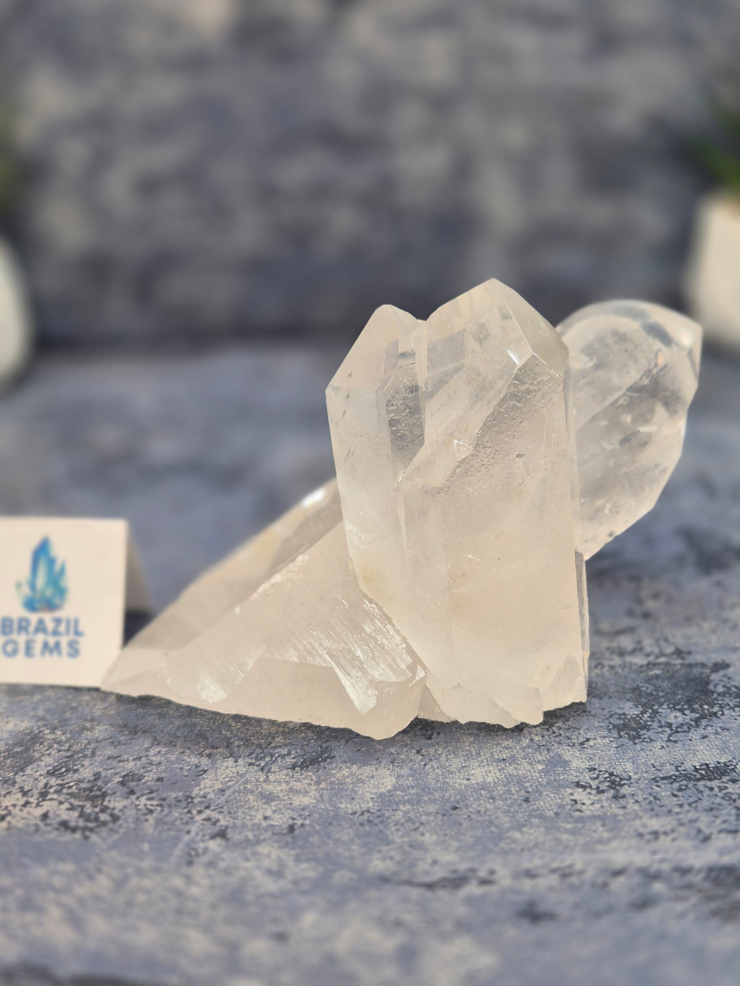 Hand Carved Clear Quartz Skull on Natural Cluster Base