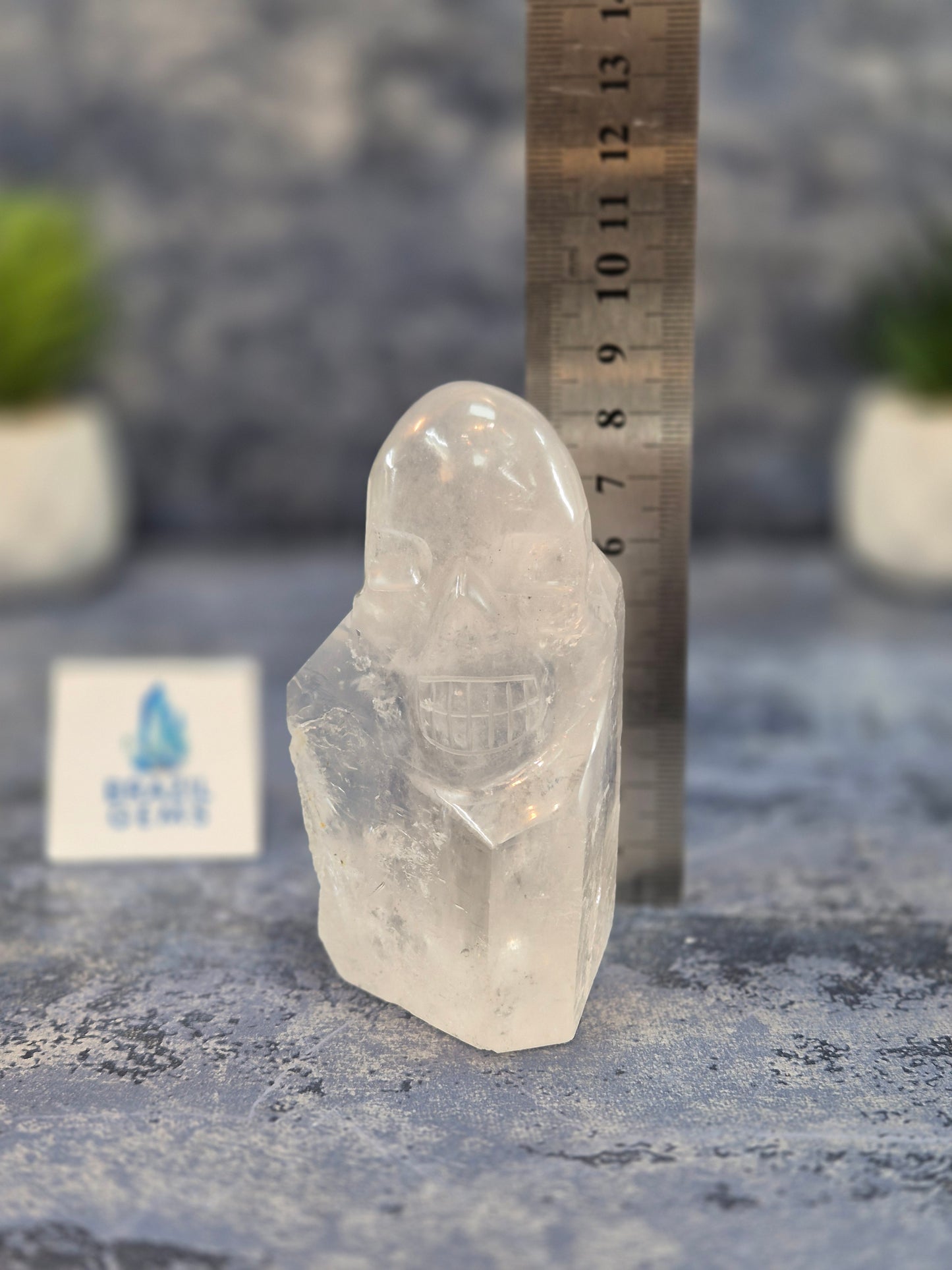 Hand Carved Clear Quartz Skull on Natural Quartz Base