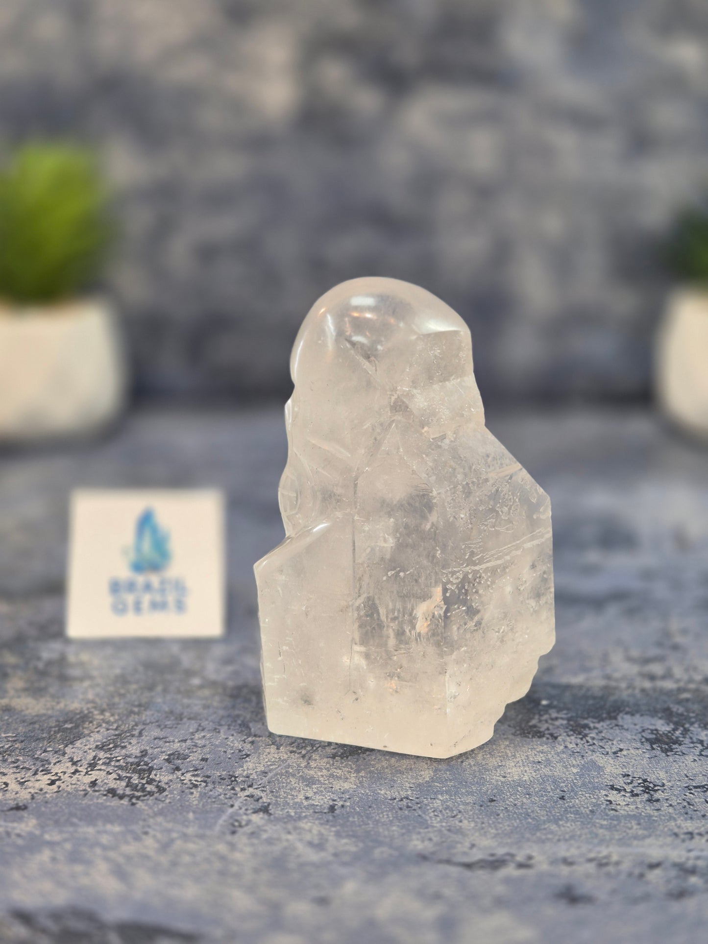 Hand Carved Clear Quartz Skull on Natural Quartz Base