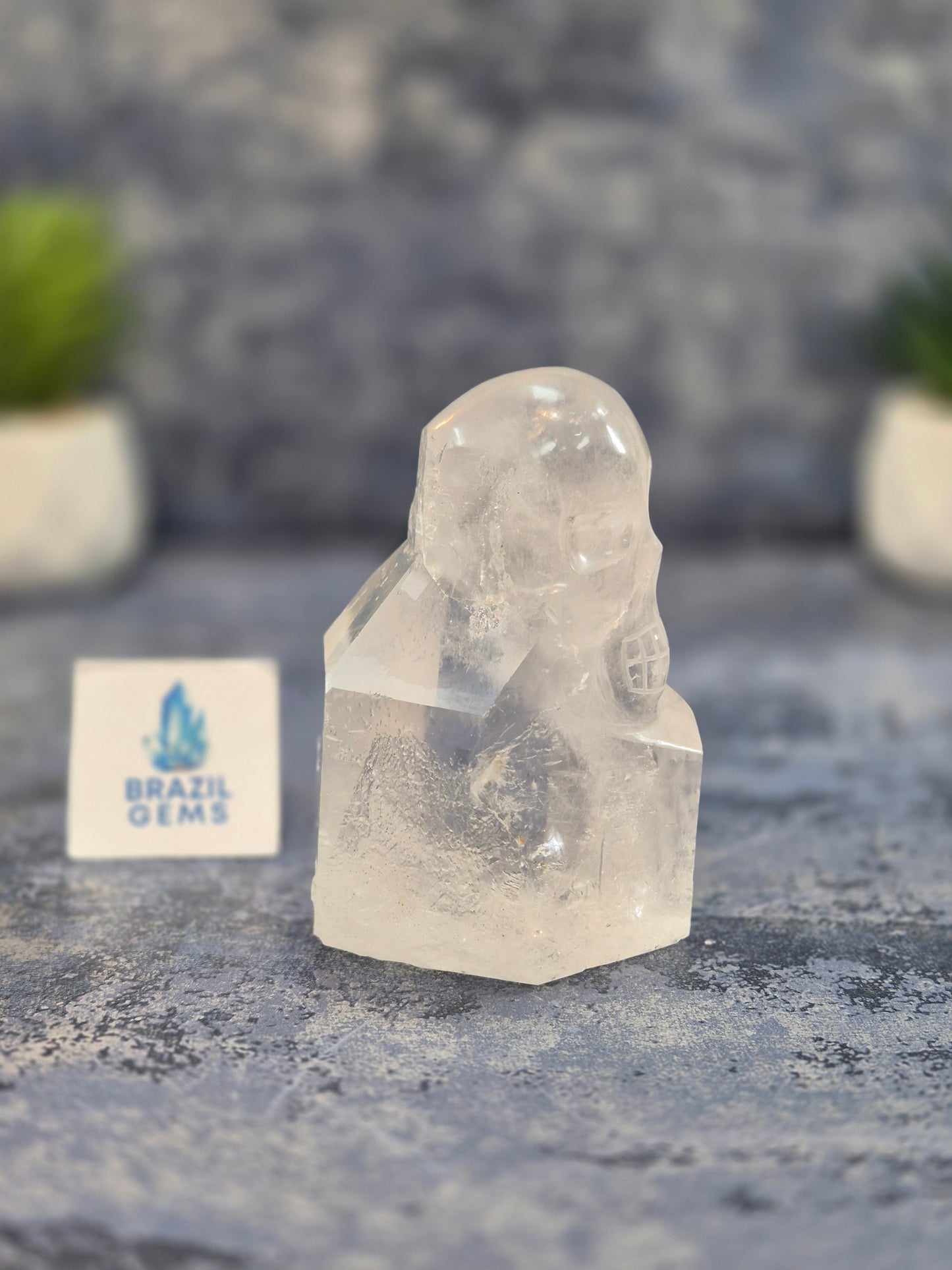 Hand Carved Clear Quartz Skull on Natural Quartz Base